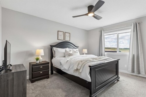 363 Precedence Hill, Cochrane, AB - Indoor Photo Showing Bedroom