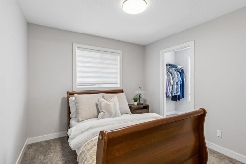 363 Precedence Hill, Cochrane, AB - Indoor Photo Showing Bedroom