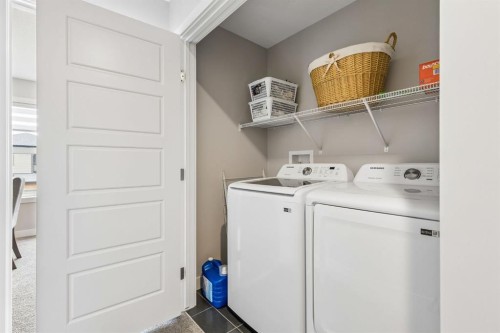 363 Precedence Hill, Cochrane, AB - Indoor Photo Showing Laundry Room