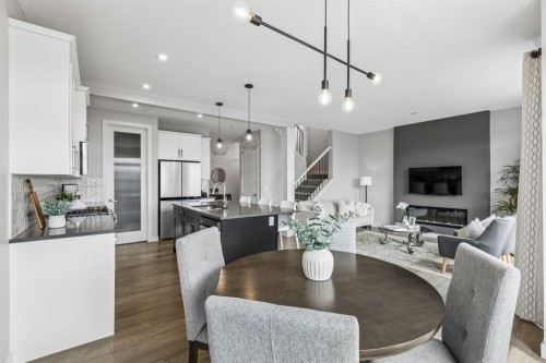 363 Precedence Hill, Cochrane, AB - Indoor Photo Showing Dining Room