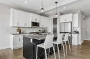 363 Precedence Hill, Cochrane, AB  - Indoor Photo Showing Kitchen With Upgraded Kitchen 