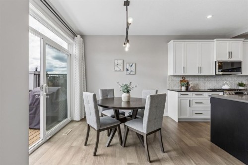363 Precedence Hill, Cochrane, AB - Indoor Photo Showing Dining Room