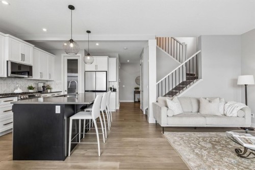 363 Precedence Hill, Cochrane, AB - Indoor Photo Showing Kitchen With Upgraded Kitchen