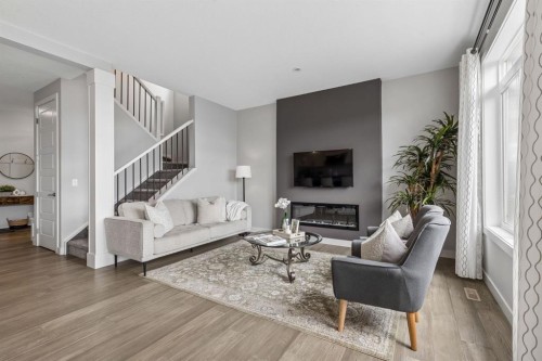 363 Precedence Hill, Cochrane, AB - Indoor Photo Showing Living Room