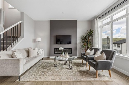 363 Precedence Hill, Cochrane, AB - Indoor Photo Showing Living Room