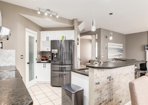 124 Copperfield Green Se, Calgary, AB - Indoor Photo Showing Kitchen With Upgraded Kitchen