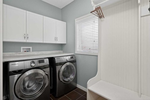 125 Cranleigh Park Se, Calgary, AB - Indoor Photo Showing Laundry Room