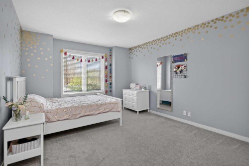 125 Cranleigh Park Se, Calgary, AB - Indoor Photo Showing Bedroom