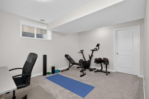 125 Cranleigh Park Se, Calgary, AB - Indoor Photo Showing Gym Room