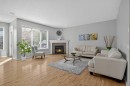 125 Cranleigh Park Se, Calgary, AB  - Indoor Photo Showing Living Room With Fireplace 