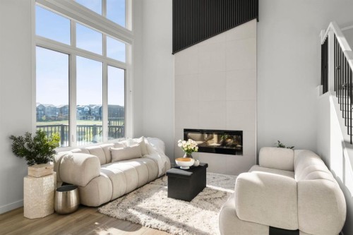 264 Mallard Grove Se, Calgary, AB - Indoor Photo Showing Living Room With Fireplace