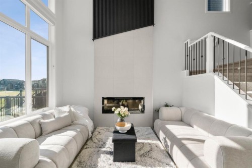 264 Mallard Grove Se, Calgary, AB - Indoor Photo Showing Living Room With Fireplace
