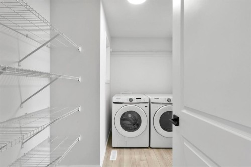 264 Mallard Grove Se, Calgary, AB - Indoor Photo Showing Laundry Room