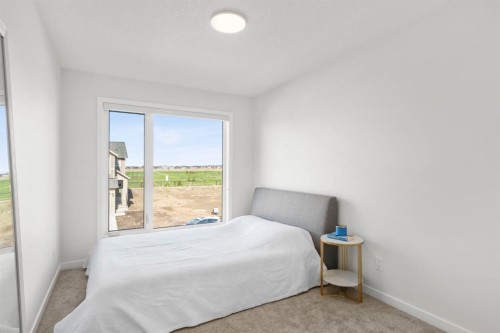 264 Mallard Grove Se, Calgary, AB - Indoor Photo Showing Bedroom