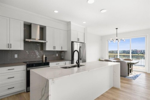 264 Mallard Grove Se, Calgary, AB - Indoor Photo Showing Kitchen With Upgraded Kitchen