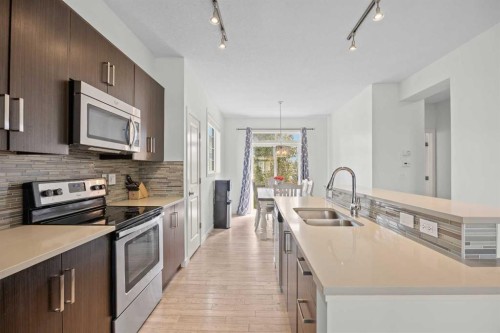 134 Walden Circle Se, Calgary, AB - Indoor Photo Showing Kitchen With Double Sink With Upgraded Kitchen