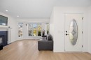 176 Arbour Grove Close Nw, Calgary, AB  - Indoor Photo Showing Living Room With Fireplace 