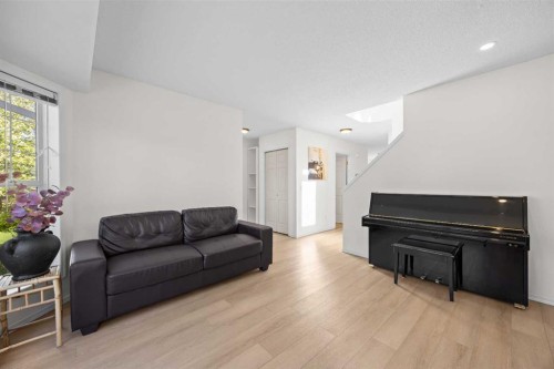 176 Arbour Grove Close Nw, Calgary, AB - Indoor Photo Showing Living Room