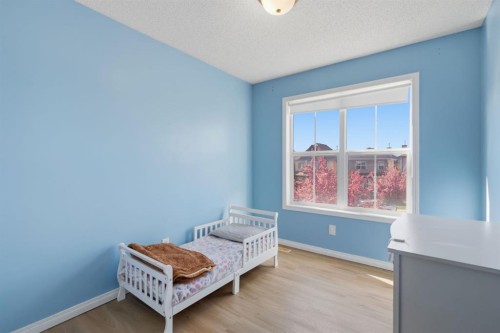 80 Prestwick Bay Se, Calgary, AB - Indoor Photo Showing Bedroom