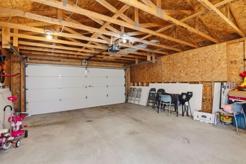 80 Prestwick Bay Se, Calgary, AB - Indoor Photo Showing Garage