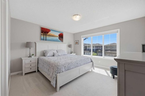 58 Kingfisher Crescent Se, Airdrie, AB - Indoor Photo Showing Bedroom
