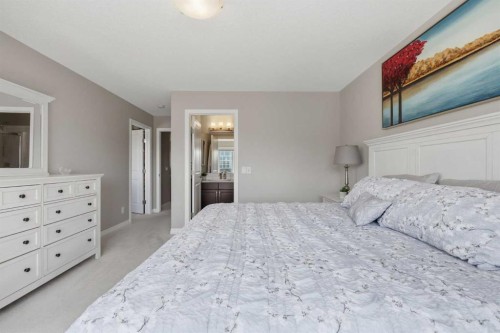 58 Kingfisher Crescent Se, Airdrie, AB - Indoor Photo Showing Bedroom