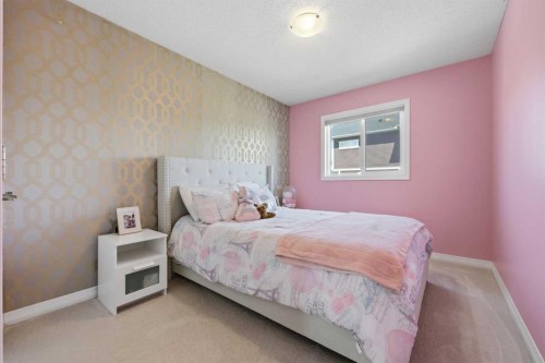 58 Kingfisher Crescent Se, Airdrie, AB - Indoor Photo Showing Bedroom