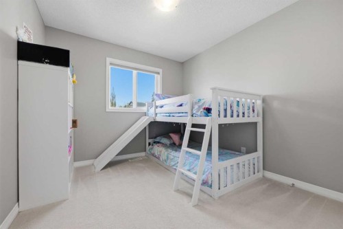 58 Kingfisher Crescent Se, Airdrie, AB - Indoor Photo Showing Bedroom