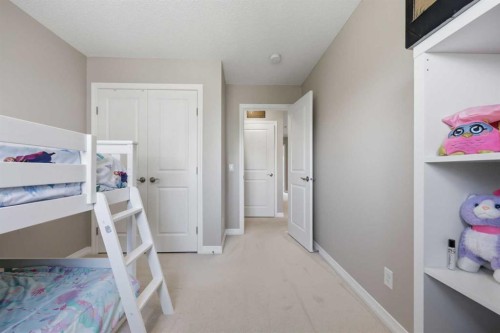 58 Kingfisher Crescent Se, Airdrie, AB - Indoor Photo Showing Bedroom