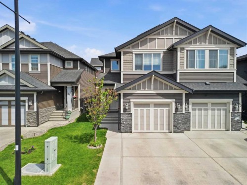 58 Kingfisher Crescent Se, Airdrie, AB - Outdoor With Facade