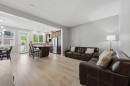 58 Kingfisher Crescent Se, Airdrie, AB  - Indoor Photo Showing Living Room 