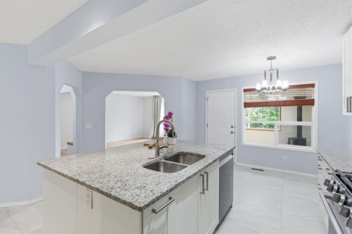 128 Valley Brook Circle Nw, Calgary, AB - Indoor Photo Showing Kitchen With Double Sink