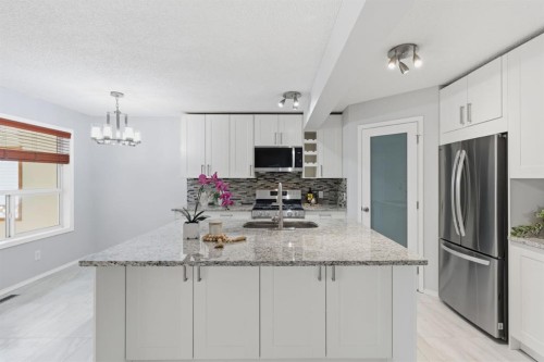 128 Valley Brook Circle Nw, Calgary, AB - Indoor Photo Showing Kitchen With Upgraded Kitchen