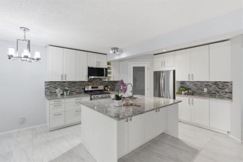 128 Valley Brook Circle Nw, Calgary, AB - Indoor Photo Showing Kitchen With Upgraded Kitchen