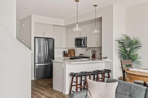 77 Magnolia Heath Se, Calgary, AB - Indoor Photo Showing Kitchen With Stainless Steel Kitchen