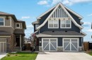 77 Magnolia Heath Se, Calgary, AB  - Outdoor With Facade 