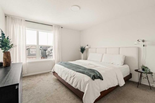 77 Magnolia Heath Se, Calgary, AB - Indoor Photo Showing Bedroom