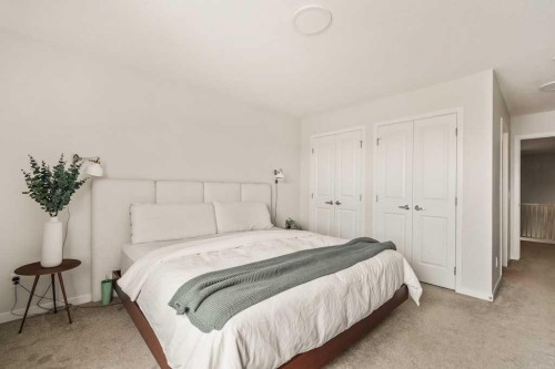 77 Magnolia Heath Se, Calgary, AB - Indoor Photo Showing Bedroom
