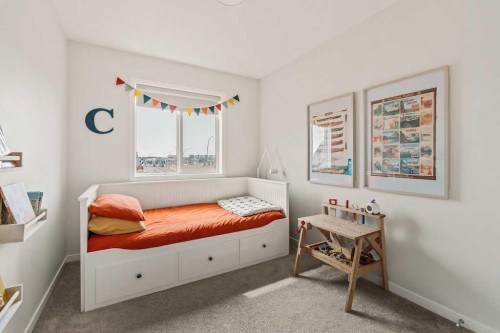 77 Magnolia Heath Se, Calgary, AB - Indoor Photo Showing Bedroom