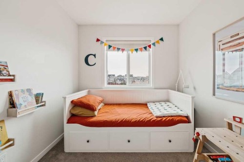 77 Magnolia Heath Se, Calgary, AB - Indoor Photo Showing Bedroom