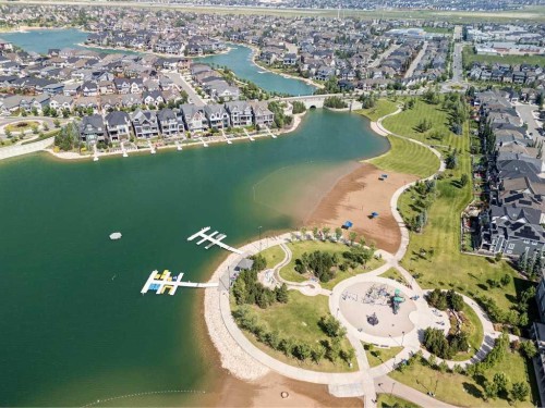 77 Magnolia Heath Se, Calgary, AB - Outdoor With Body Of Water With View