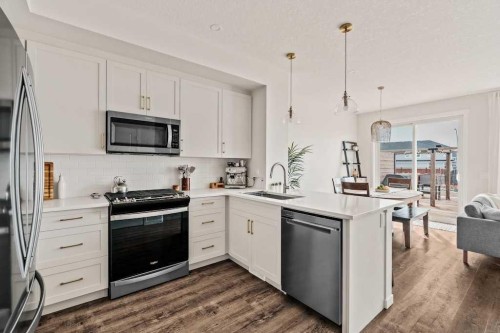 77 Magnolia Heath Se, Calgary, AB - Indoor Photo Showing Kitchen With Stainless Steel Kitchen With Upgraded Kitchen
