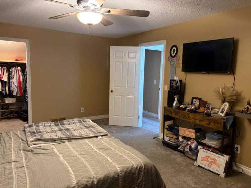1065 East Chestermere Drive, Chestermere, AB - Indoor Photo Showing Bedroom