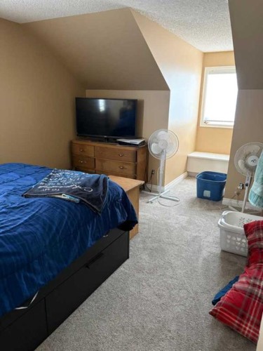 1065 East Chestermere Drive, Chestermere, AB - Indoor Photo Showing Bedroom