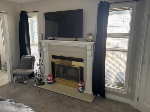 1065 East Chestermere Drive, Chestermere, AB - Indoor With Fireplace