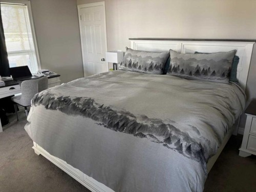 1065 East Chestermere Drive, Chestermere, AB - Indoor Photo Showing Bedroom