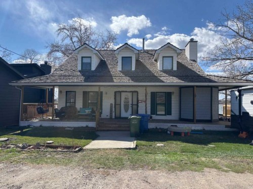 1065 East Chestermere Drive, Chestermere, AB - Outdoor With Deck Patio Veranda With Facade