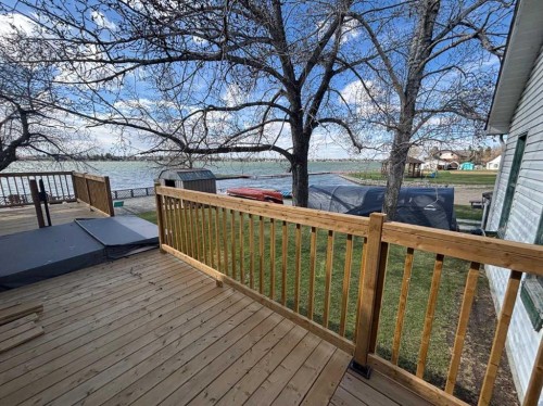 1065 East Chestermere Drive, Chestermere, AB - Outdoor With Deck Patio Veranda