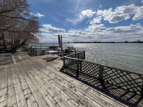 1065 East Chestermere Drive, Chestermere, AB - Outdoor With Body Of Water With Deck Patio Veranda With View