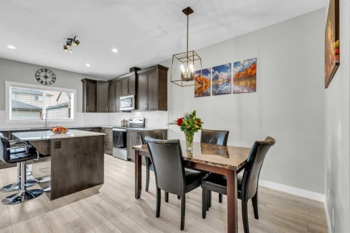 114 Hillcrest Close Sw, Airdrie, AB - Indoor Photo Showing Dining Room